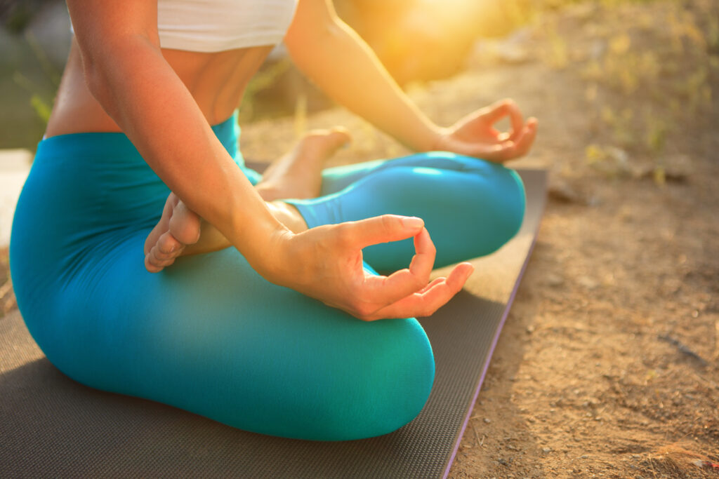 Young woman is practicing yoga